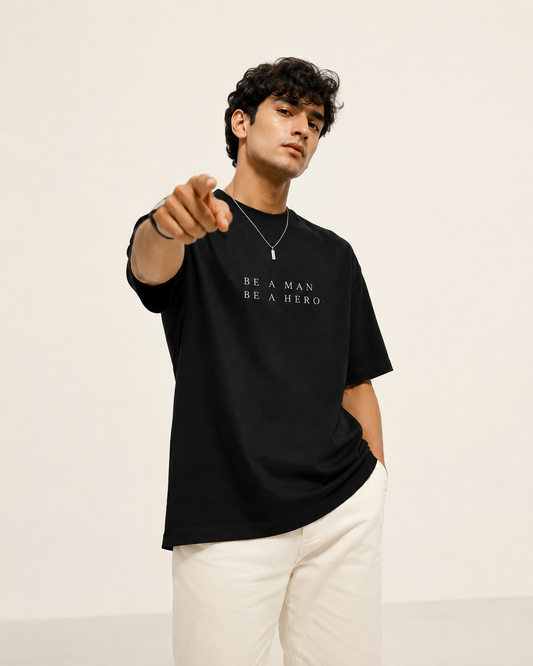 BE A MAN. BE A HERO. — Unisex Stretch T-Shirt