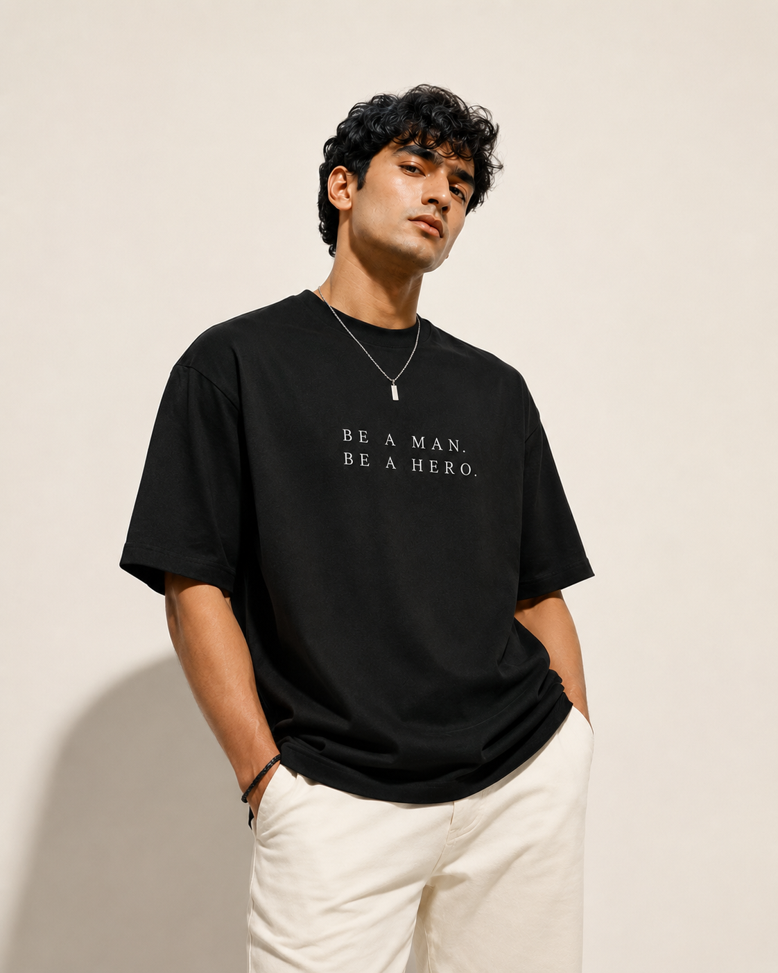 BE A MAN. BE A HERO. — Unisex Stretch T-Shirt