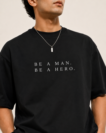 BE A MAN. BE A HERO. — Unisex Stretch T-Shirt